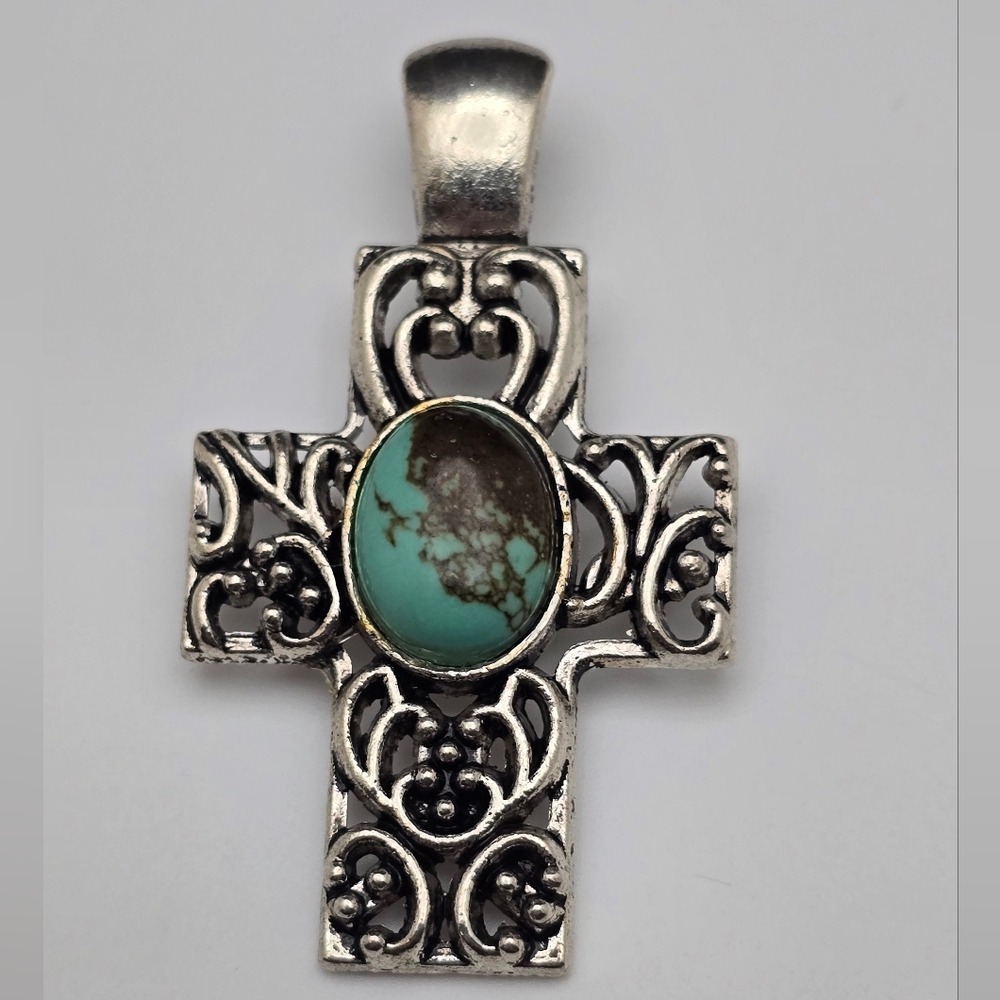 Intricate Silver Cross Pendant with Turquoise Accent